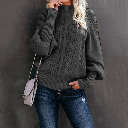 Damenpullover mit hohem Kragen, grau, Strickmuster, warm, modisch, Herbstmode, Freizeitlook.