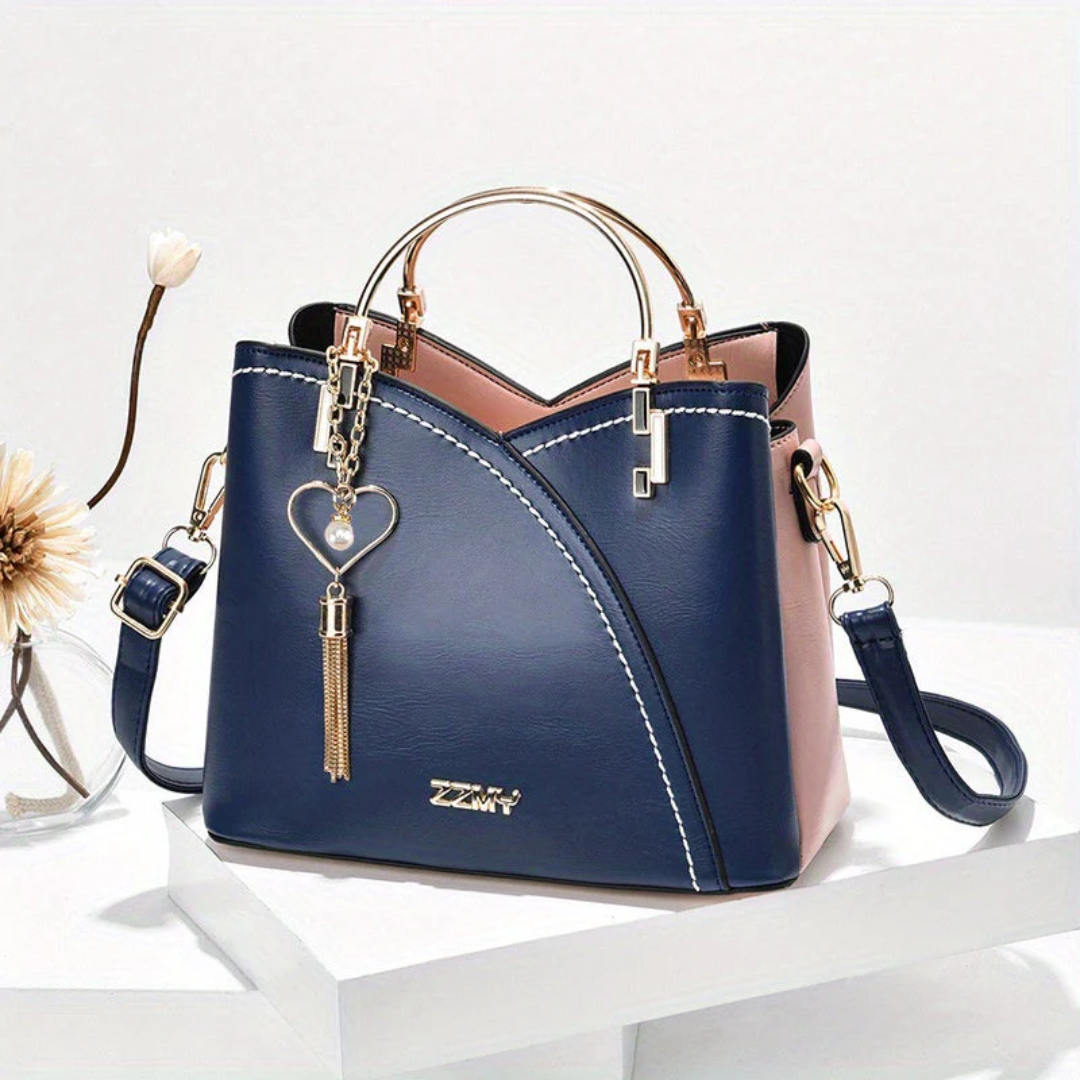 Damenhandtasche aus Leder, blau-rosa, mit Herzanhänger, modisch, elegant, für Alltag.