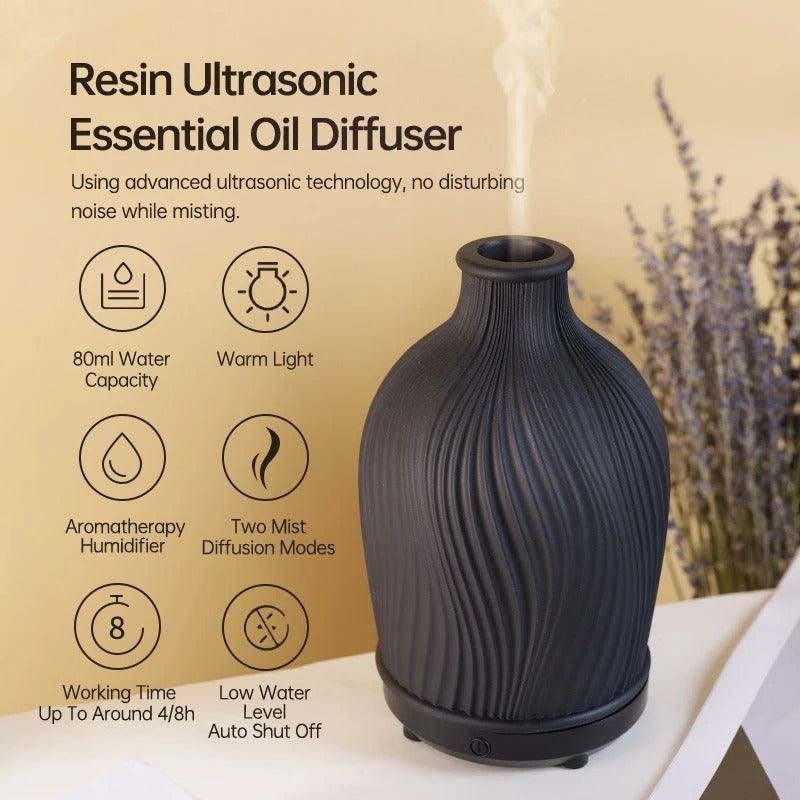 Schwarzer Harz-Ultraschall-Diffusor, 80ml, Aromatherapie, warmes Licht, leiser Betrieb.