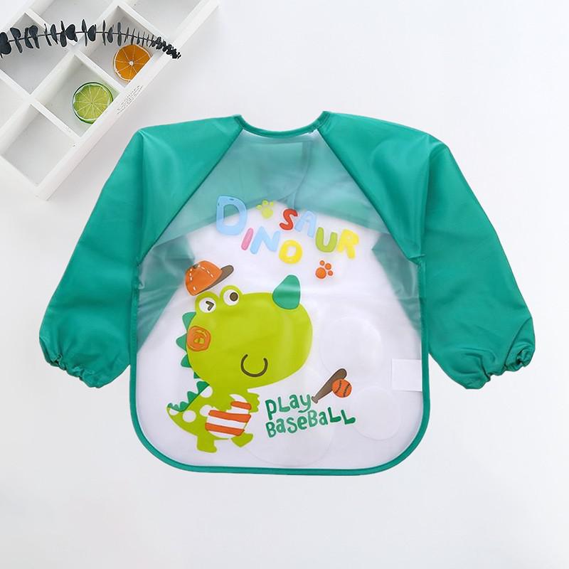 Grünes Kinder-Lätzchen mit Dinosaurier-Motiv, langärmlig, wasserdicht, ideal für Mahlzeiten.