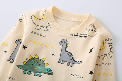 Beige Kinderpullover mit Dinosaurier-Muster, Baumwolle, langärmelig, Cartoon-Design.