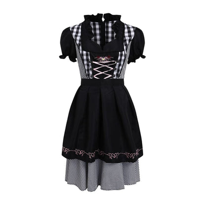 Schwarzes Dirndl mit Karomuster, Rüschenkragen und Schnürung, traditionelles bayerisches Kleid.