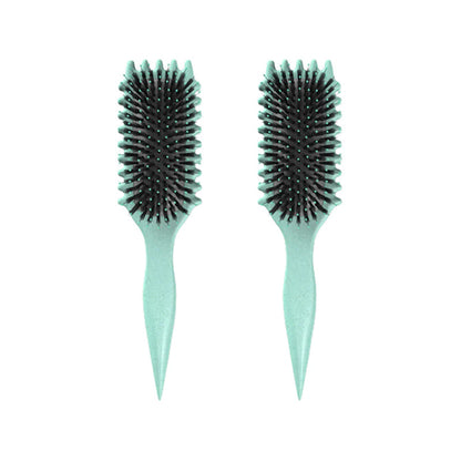 Zwei grüne Haarbürsten mit schwarzen Borsten, ergonomischer Griff, ideal für Styling und Pflege.