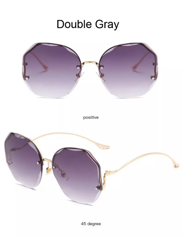 Damen Sonnenbrille, achteckig, grau getönt, goldene Bügel, modisch, UV-Schutz.