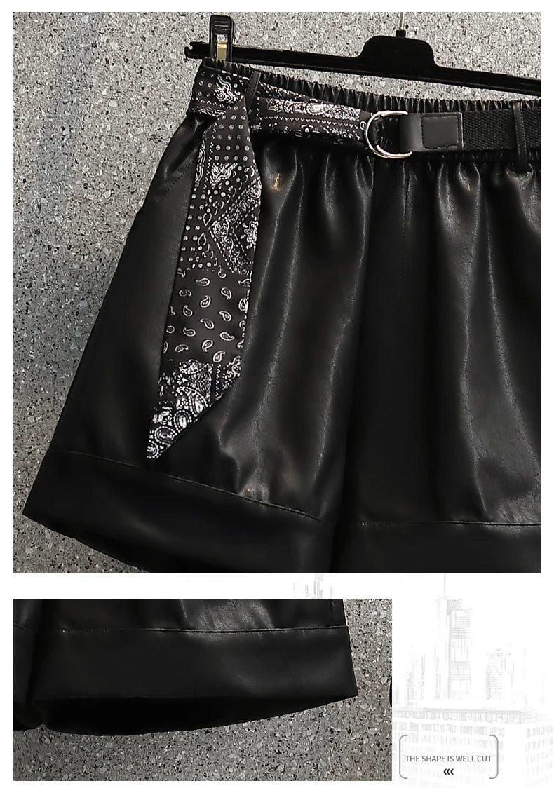 Schwarzer Lederrock mit Gürtel und Paisley-Muster, modisch, elegant, Damenbekleidung.
