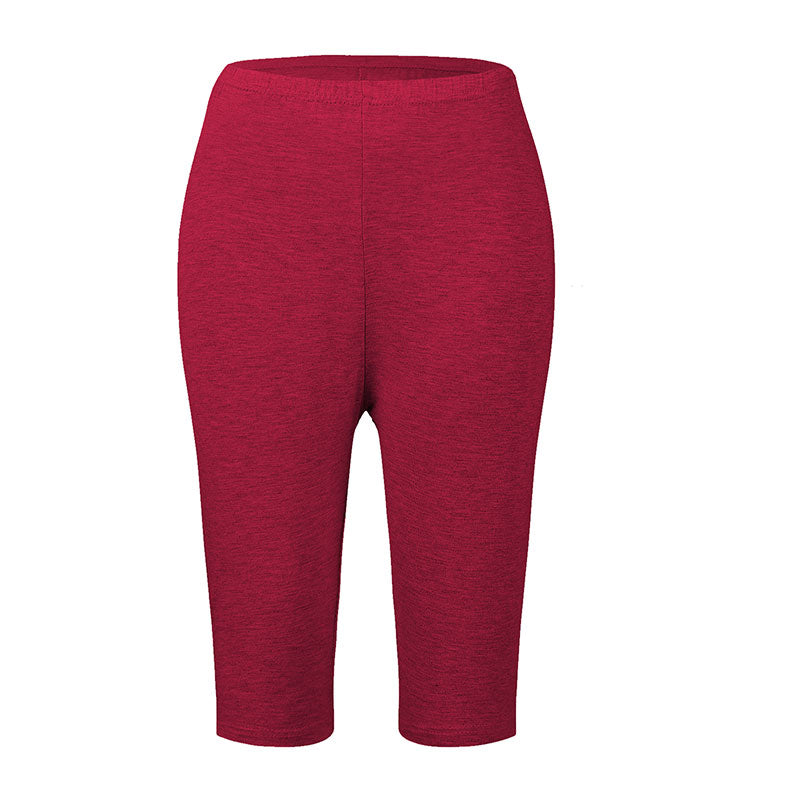 Rote Damen-Leggings, knielang, elastisch, bequem, ideal für Sport und Freizeit.