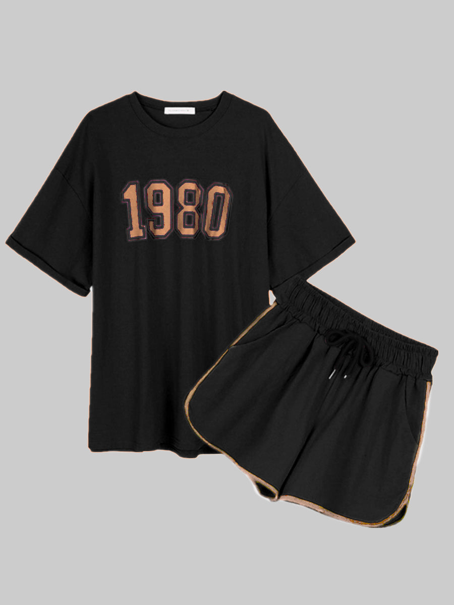Schwarzes T-Shirt und Shorts Set, Jahrgang 1980, Baumwolle, lässige Sportbekleidung.