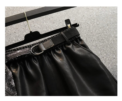 Schwarzer Lederrock mit Gürtel, D-Ring, elastischem Bund, modisch, elegant, Damenmode.