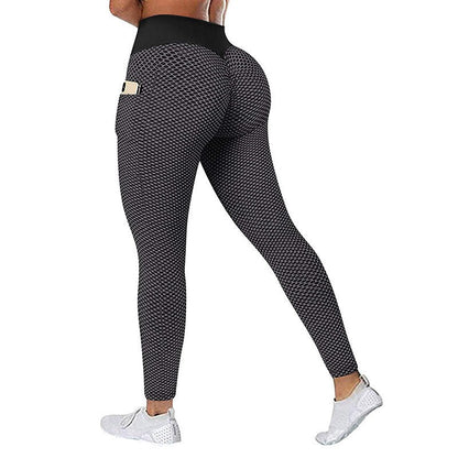 Damen Sportleggings schwarz, nahtlos, mit Handy-Tasche, ideal für Fitness und Yoga.
