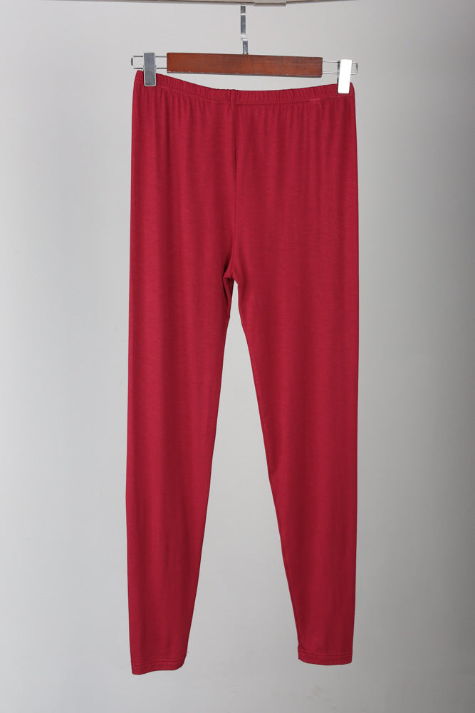 Rote Damen-Leggings aus Baumwolle, bequem, elastisch, ideal für Freizeit und Sport.
