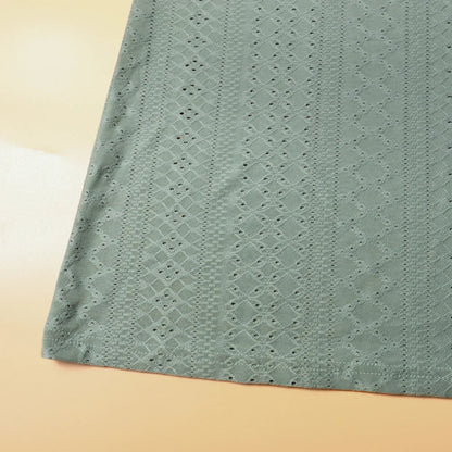 Grüner Spitzenstoff, geometrisches Muster, Textilmaterial, Nähzubehör, DIY-Projekte.