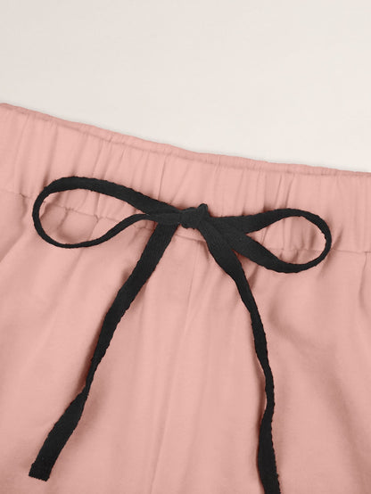 Rosa Pyjamahose mit schwarzer Schleife, Baumwolle, Damenmode, bequem, Nachtwäsche.
