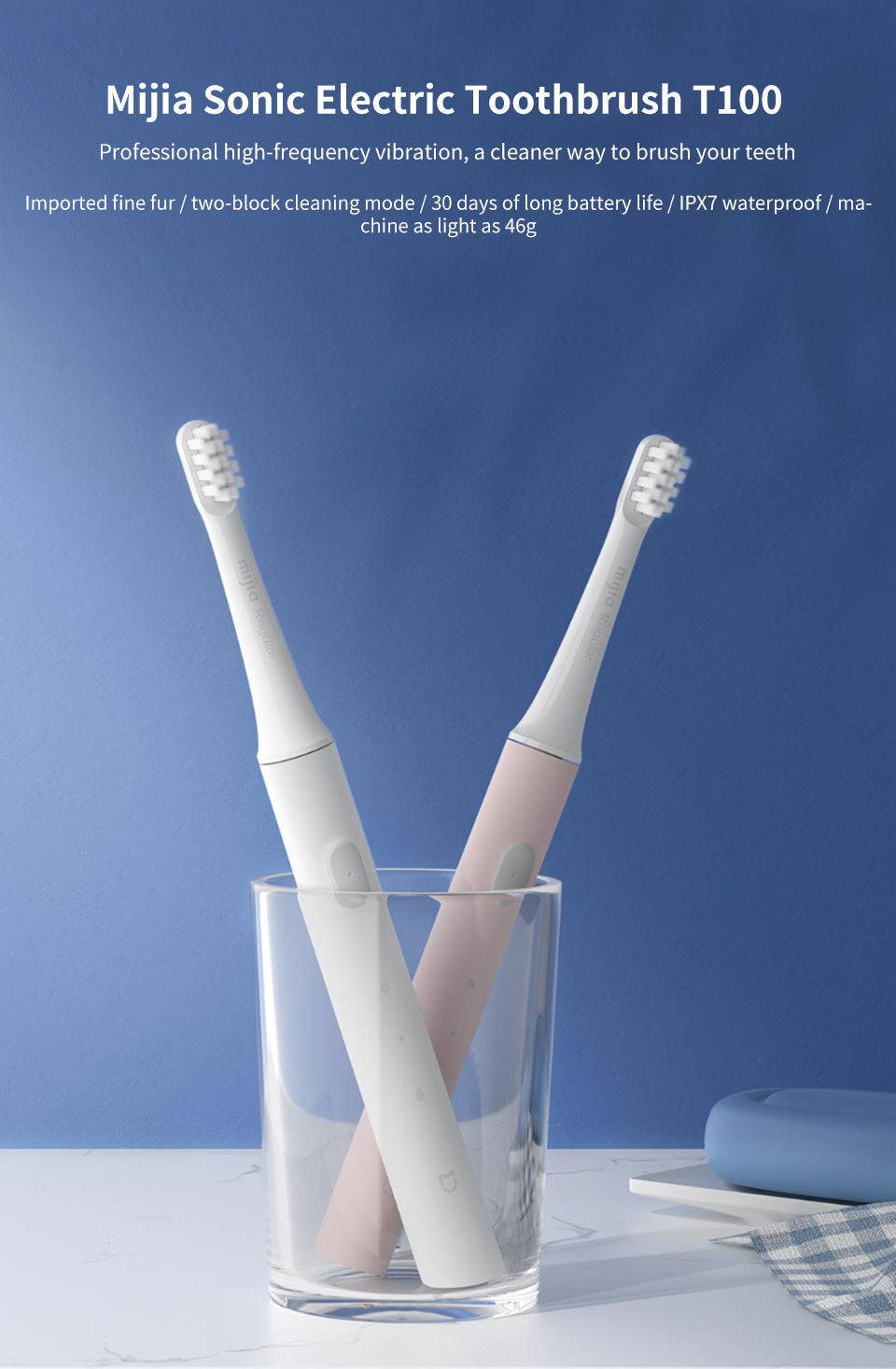 Zwei Mijia Sonic elektrische Zahnbürsten T100, weiß und rosa, in einem Glas.