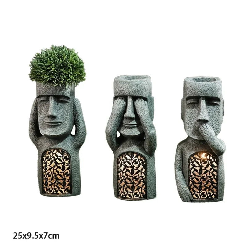Drei graue Moai-Blumentöpfe mit LED-Licht, Garten-Dekoration, 25x9,5x7 cm.