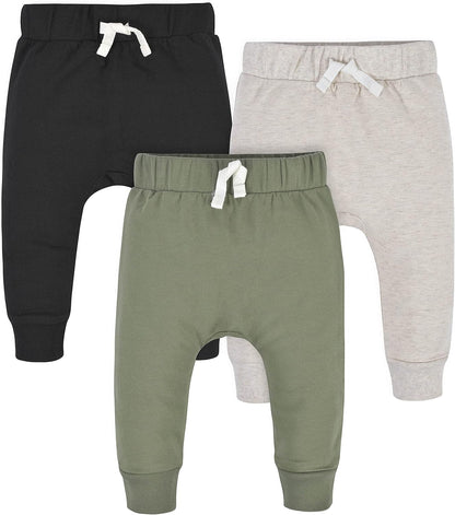 Dreierpack Baby-Jogginghosen, schwarz, grün, beige, Baumwolle, elastischer Bund, Kordelzug.