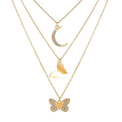 Goldene Halskette mit Schmetterling und Mondanhänger, Damen Schmuck, modisch, elegant.