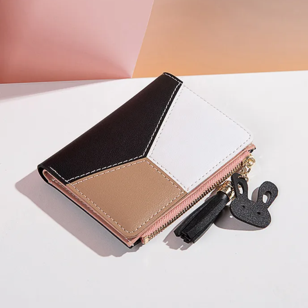 Dreifarbige Damen-Geldbörse aus Leder mit Reißverschluss und Quaste, schwarz, weiß, beige.
