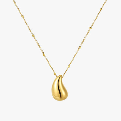 Goldene Tropfen-Halskette, elegantes Design, Damen-Schmuck, modisches Accessoire.