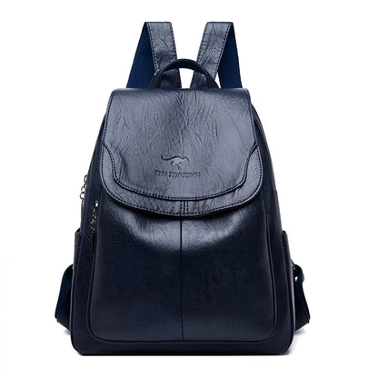 Dunkelblauer Lederrucksack, modisch, strapazierfähig, ideal für Reisen und Alltag.