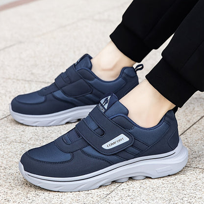 Dunkelblaue Herren-Sneaker mit Klettverschluss, bequeme Sportschuhe, rutschfeste Sohle.