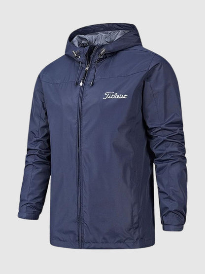 Dunkelblaue Titleist Herrenjacke mit Kapuze, wasserabweisend, ideal für Golf und Outdoor.