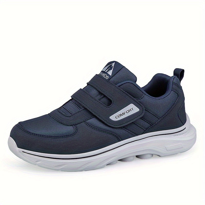 Dunkelblauer Herren-Sneaker mit Klettverschluss, bequeme Sohle, sportlich, atmungsaktiv.
