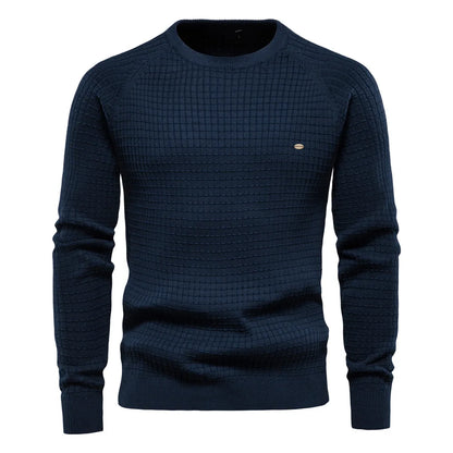 Dunkelblauer Herrenpullover, Strickmuster, Rundhalsausschnitt, Baumwolle, modisch, elegant.