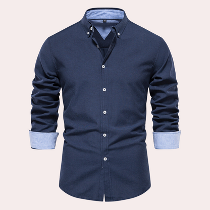 Dunkelblaues Herrenhemd, Button-Down, langärmelig, Baumwolle, elegantes Design.