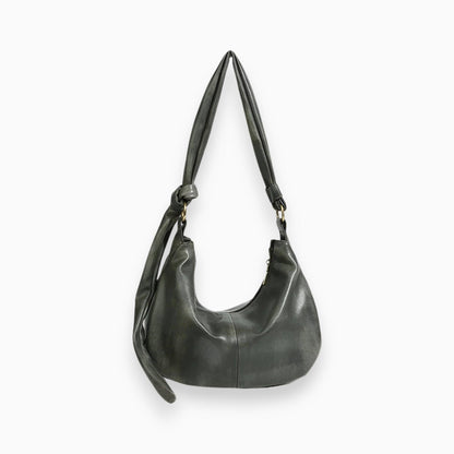 Grüne Ledertasche mit Knotenriemen, modische Damenhandtasche, elegantes Design.