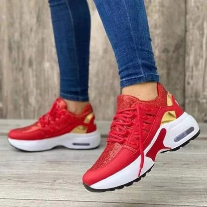 Rote Damen-Sneaker mit weißer Sohle, sportlich, modern, bequem, ideal für Freizeit und Sport.
