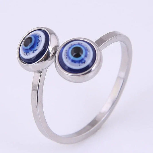 Silberring mit zwei blauen Augen, Edelstahl, modisches Schmuckstück, böser Blick Design.