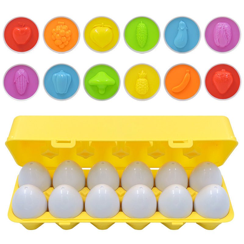 Gelbes Eierkarton-Spielzeug mit weißen Plastikeiern und bunten Frucht- und Gemüseformen.