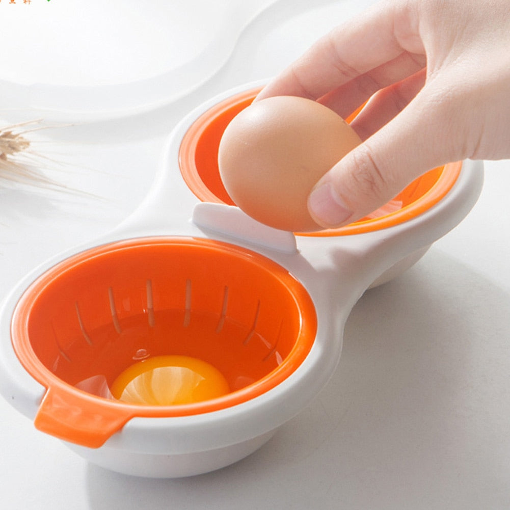 Eiertrenner aus Kunststoff, orange-weiß, handgehalten, Küchenzubehör, Eiweiß vom Eigelb trennen.
