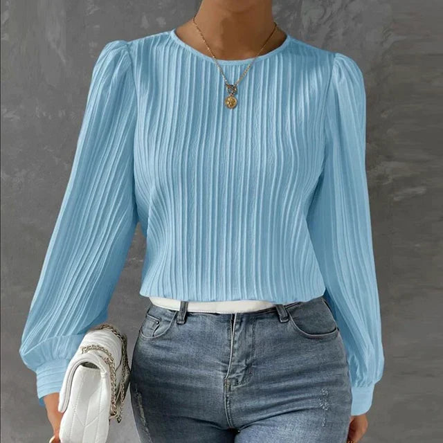 Elegante blaue Damenbluse mit langen Ärmeln, plissiert, Herbstmode, O-Ausschnitt.