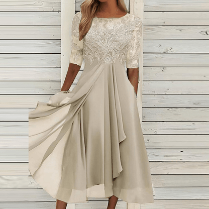 Elegantes cremefarbenes Sommerkleid mit Spitze, knielang, Damenmode, schick, einzigartig.
