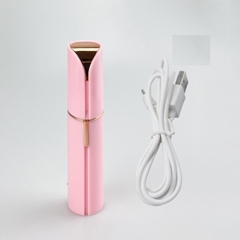Rosa elektrischer Gesichtshaarentferner mit USB-Kabel, tragbar, wiederaufladbar.