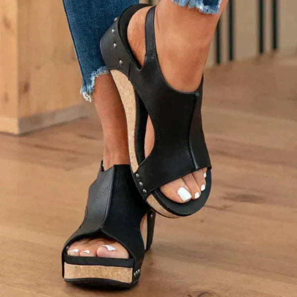 Schwarze orthopädische Damensandalen, Leder, Keilabsatz, bequem, modisch.