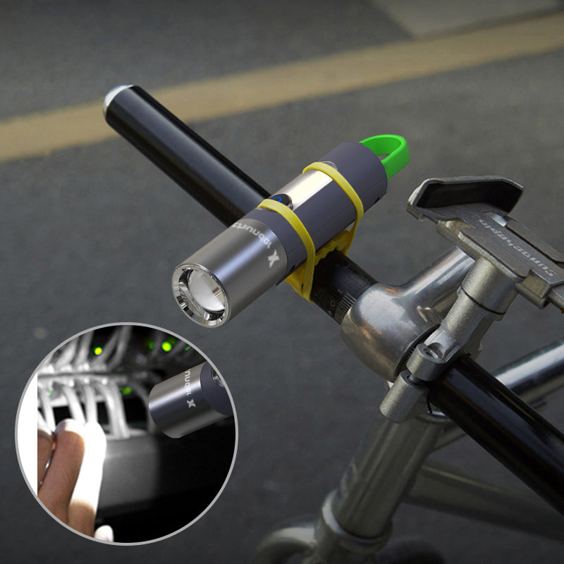 Fahrradlampe LED, grau, am Lenker montiert, ideal für Nachtfahrten, wasserdicht, USB-aufladbar.