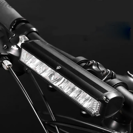 Schwarzes LED-Fahrradlicht, wasserdicht, montiert am Lenker, für sicheres Nachtfahren.