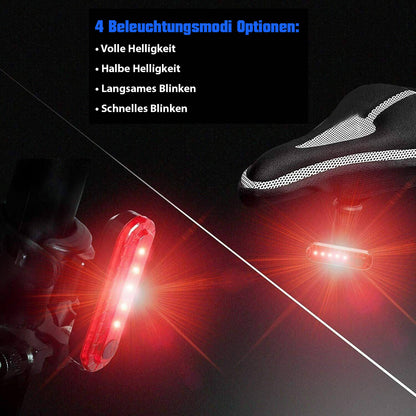 Rotes LED-Fahrradlicht mit vier Modi, montiert am Fahrrad, für Sicherheit und Sichtbarkeit.