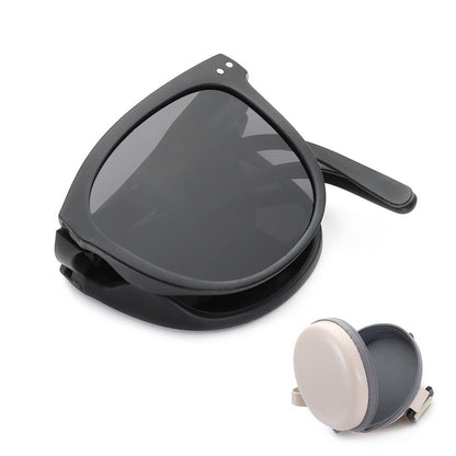 Schwarze faltbare Sonnenbrille mit Etui, UV-Schutz, modisch, kompakt, Reiseaccessoire.