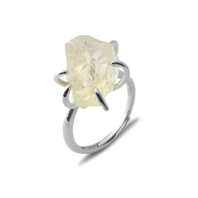 Silberring mit rohem gelbem Edelstein, elegantes Schmuckdesign, einzigartiger Damenring.
