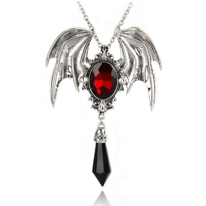 Silberne Halskette mit roten Kristallflügeln und schwarzem Anhänger, Gothic-Schmuck.