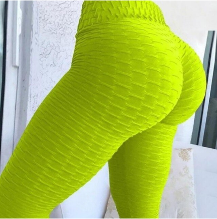 Neon-grüne Leggings, strukturierter Stoff, figurbetont, modisch, Damenbekleidung.