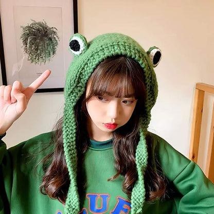 Froschmütze aus Wolle, grün, handgestrickt, mit Augen, modisches Accessoire für Damen.