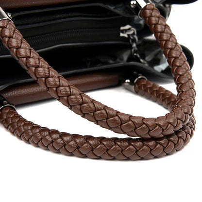 Braune geflochtene Lederhandtasche mit Reißverschluss, elegantes Design, Damenmode Accessoire.