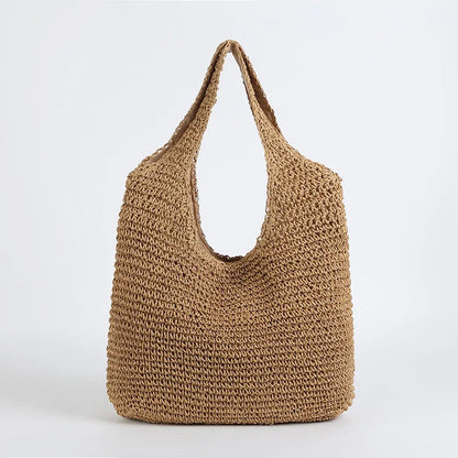 Beige gehäkelte Einkaufstasche aus Stroh, umweltfreundlich, modisch, wiederverwendbar.