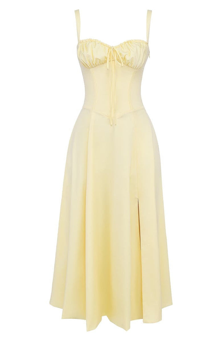 Gelbes Bustier-Sommerkleid, ärmellos, mit floralem Design, knielang, aus Baumwolle.