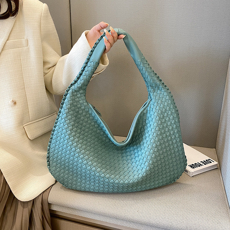 Damenhandtasche aus blauem Leder, geflochtenes Design, modisch, elegant, für Alltag und Büro.