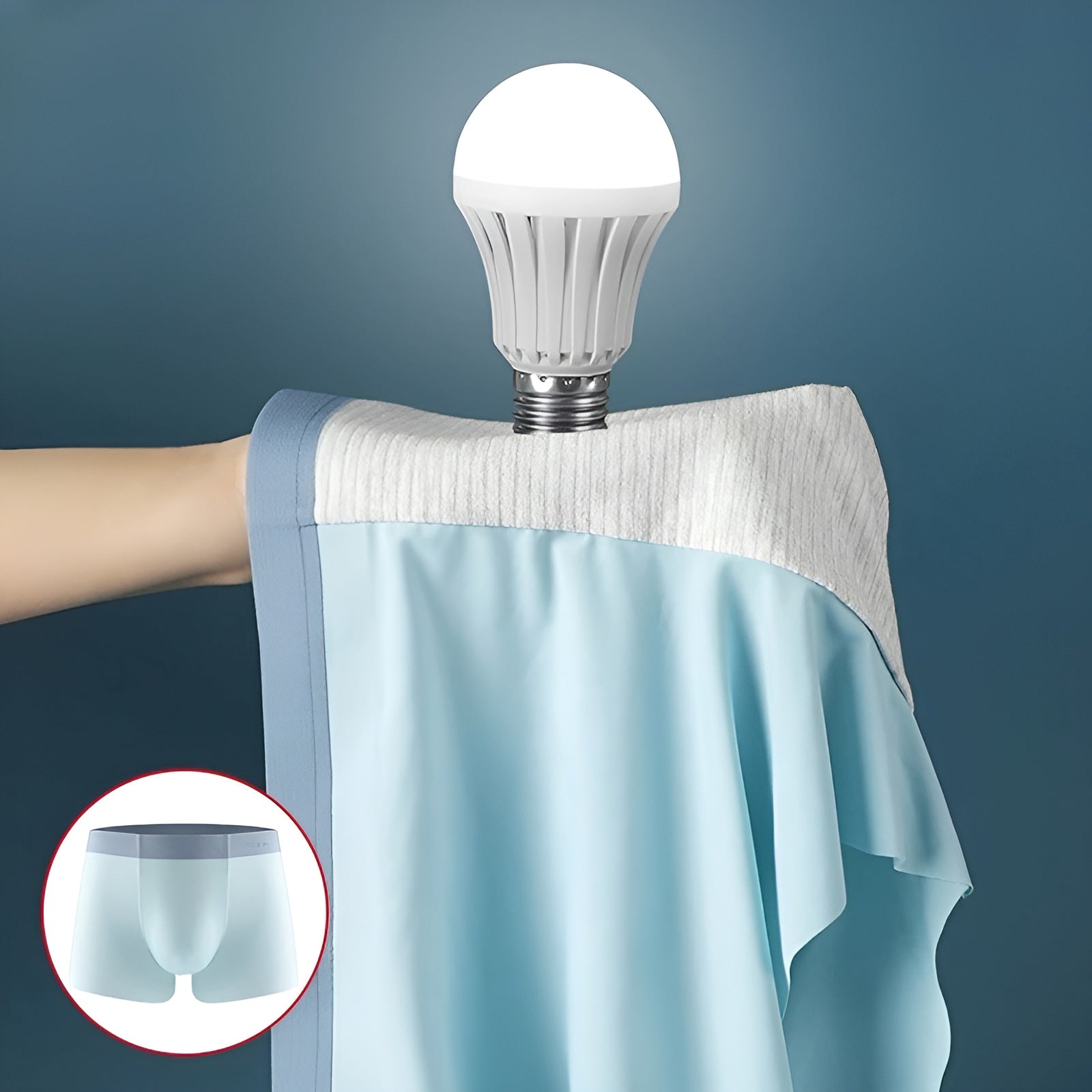 LED-Glühbirne auf blauem Stoff, energiesparend, modernes Design, Hintergrund blau.